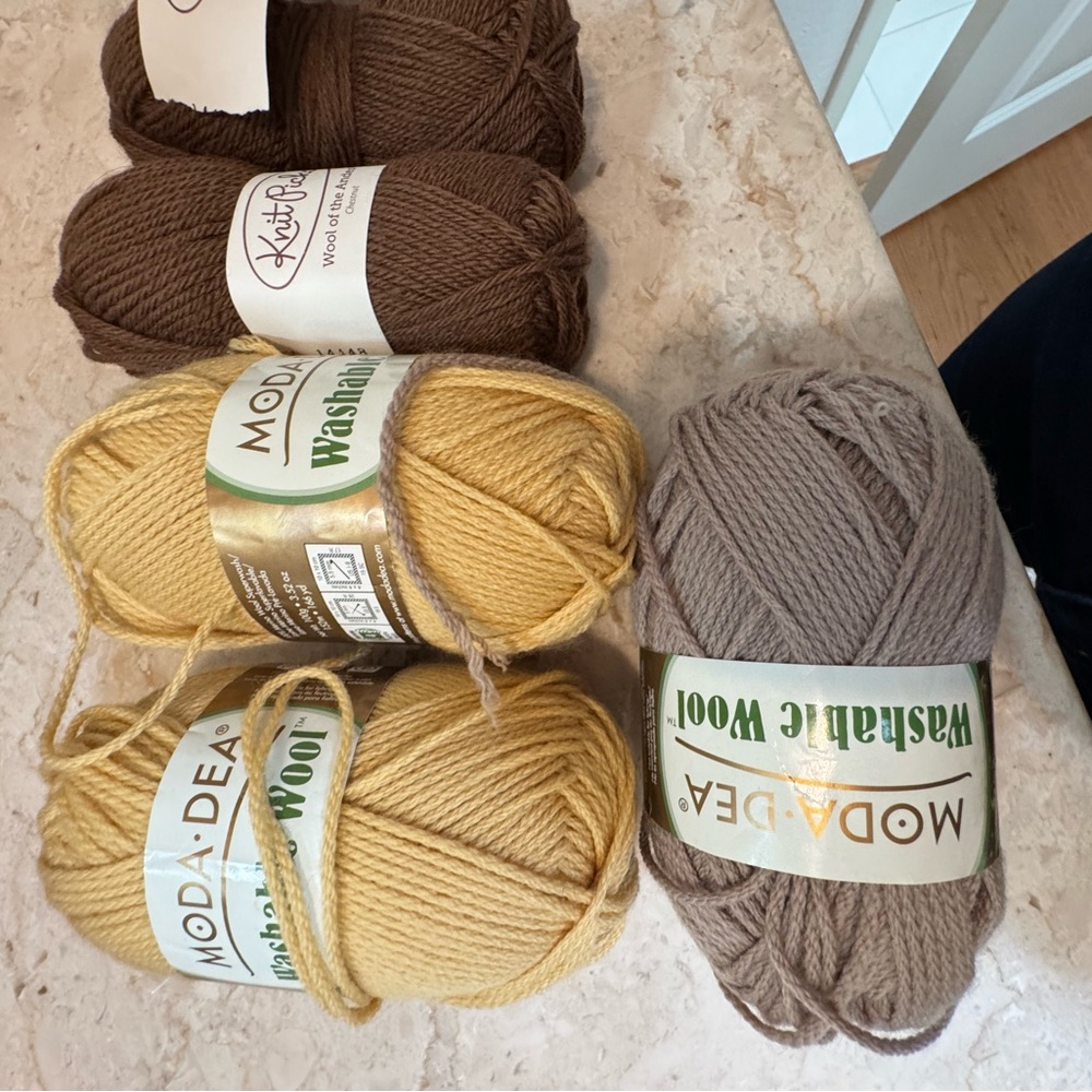 Assorted Yarn Bundle in Yellow, Brown, and Tan. 100% wool.